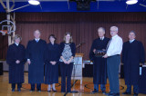 The court presents a photograph to Jim Larson, Superintendent, and Christa Brodina, Secondary Principal.</div></div>