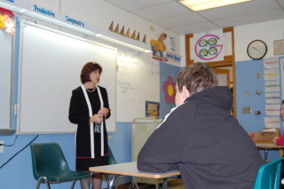 Justice Maring visits with ninth and twelfth grade students.
