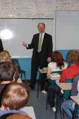 Justice Sandstrom visits with eighth and eleventh grade students.