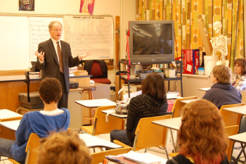 Justice Sandstrom engages a class with the finer points of the law.