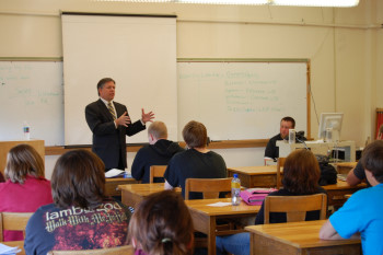 Justice Crothers outlines the legal system to a high school class.