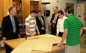 Justice Dale Sandstrom, Justice Daniel Crothers and Chief Justice Gerald VandeWalle visit the wood shop