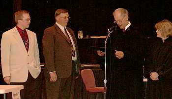 The Supreme Court presented a signed picture to principal Jeremy Larson and Superintendant Wade Faul after the hearing