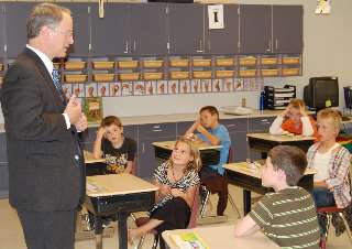 Students listen closely as Justice Dale Sandstrom explains a point