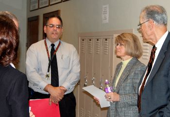 Enderlin Principal Tim Michaelson welcomes the Court as they arrive for their Oct. 31 visit.