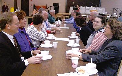 Justice Sandstrom and Justice Kapsner visit with Garrison residents at a community lunch