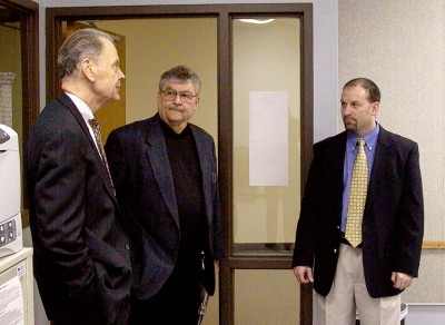 Dr. Paul Stremick, Superintendent, and Robert Bradshaw welcome Chief Justice VandeWalle to Grafton High School.