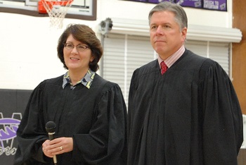 Justices Lisa Fair McEvers and Dan Crothers listen to student questions after the argument. Students from Harvey, Rugby, Anamoose-Drake, and Fessenden-Bowdon attended the session.