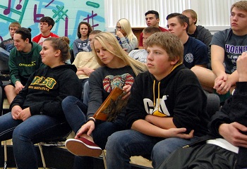 The students listen to the justices explain the work of the Court.