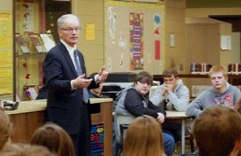Justice Dale Sandstrom talks to a class about new developments in the court system.