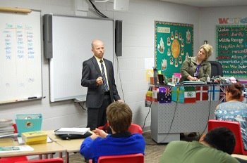 Justice Jerod Tufte talked about the Supreme Court's role with 8th grade students.