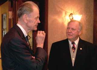 Chief Justice VandeWalle chatted with a Minot State official at the reception