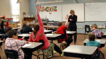 Justice Carol Kapsner takes questions from elementary school students in Trenton.