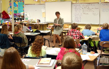 Elementary school students pay close attention to Justice Lisa Fair McEvers.