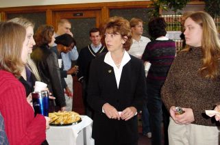 Justice Mary Maring listens to a group of law students