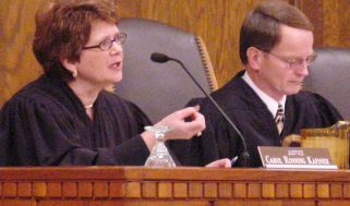 Justice Carol Kapsner asks a question