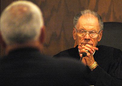Chief Justice Gerald VandeWalle listens to an attorney during the State v. Jacob arguments