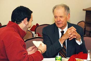 Chief Justice Gerald VandeWalle talks with a law student at lunch
