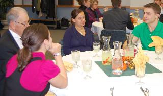 Chief Justice Gerald VandeWalle talks with UND students at lunch on Oct. 25