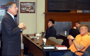 Law students listen closely as Justice Dan Crothers speaks.