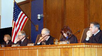 Members of the Court listen to the Moot Court finals