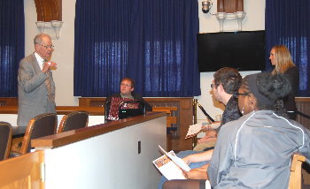 Chief Justice Gerald VandeWalle speaks to a group of sophomores from Grand Forks Central High School who visited UND to see the Court.