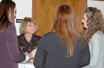 Justice Kapsner visits with UND law students over lunch.