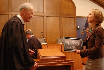 Chief Justice VandeWalle presented a photo of the Court to UND School of Law Dean Kathryn Rand after the arguments.