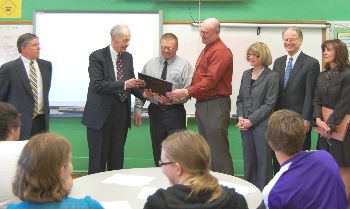 Chief Justice Vandewalle presented Principal Lee Weisgarber and Superintendant Brandt Dick with a photo as the Court concluded its visit.