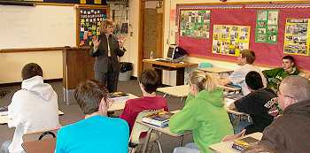 Justice Carol Kapsner speaks to a class of students