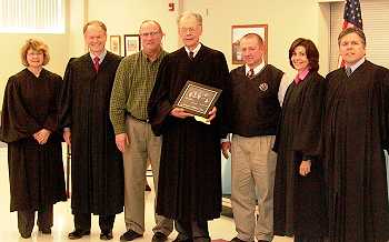The Court presented superintendant Dean Koppelman and principal Kim Knodle with a signed photo