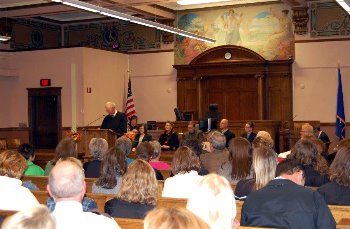 The crowd in the historic courtroom listens as Chief Justice VandeWalle speaks on behalf of the state courts.